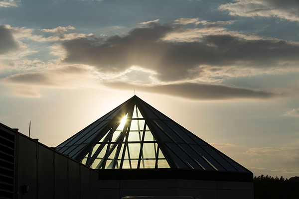 Roof of Dartmouth Hitchcock Medical Center with sunlight coming through atrium windows