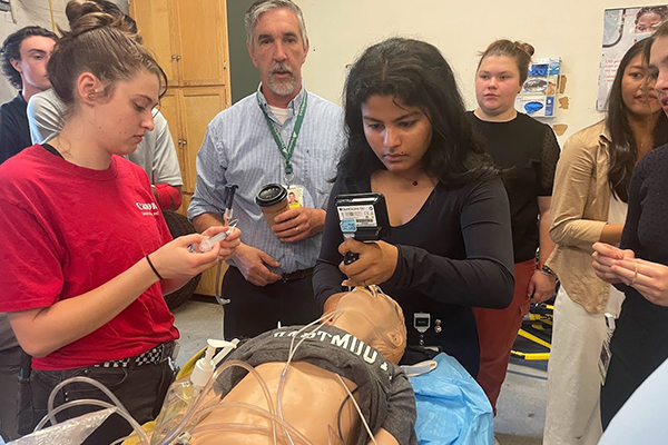 High school students participating in healthcare career exploration