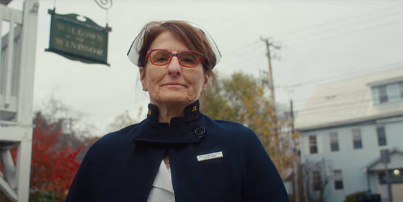 Susan Januszewski, Cardiac patient, stands outside in her nurse uniform