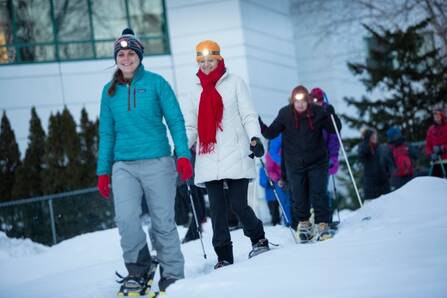 Employees snowshoeing at DHMC