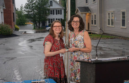 From left, Samantha K. Swetter, MD, poses with Susan Stearns, CEO of NAMI New Hampshire, with her Exemplary Psychiatrist of the Year Award.