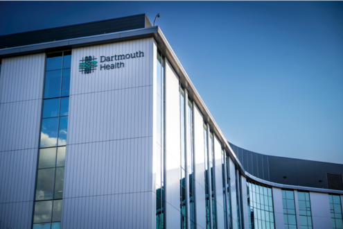 Picture of side of building with Dartmouth Health logo
