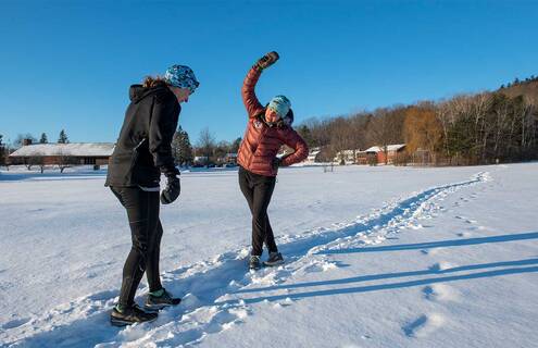 women taking a walk in the snow