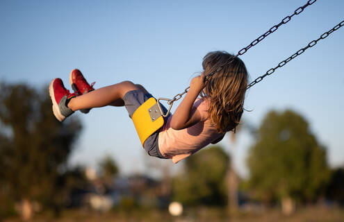 child on swing