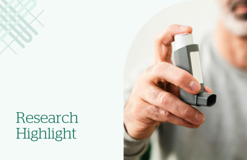 Image of man holding an inhaler
