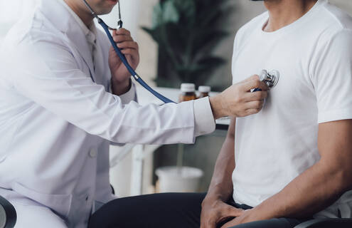 Doctor listening to a patient's heart
