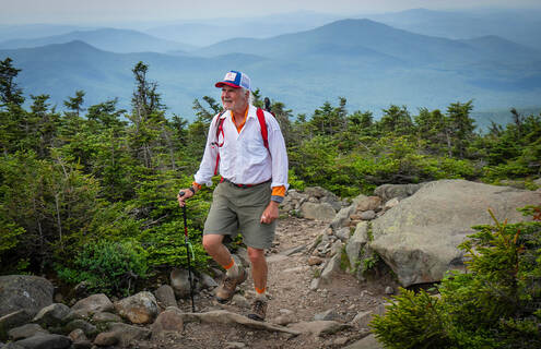 man hiking on mountain