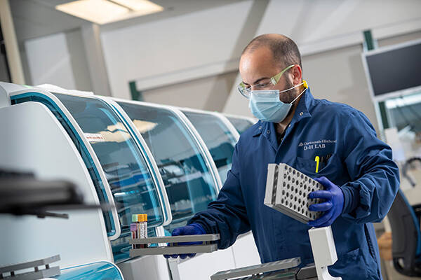 A technologist working in a pathology lab